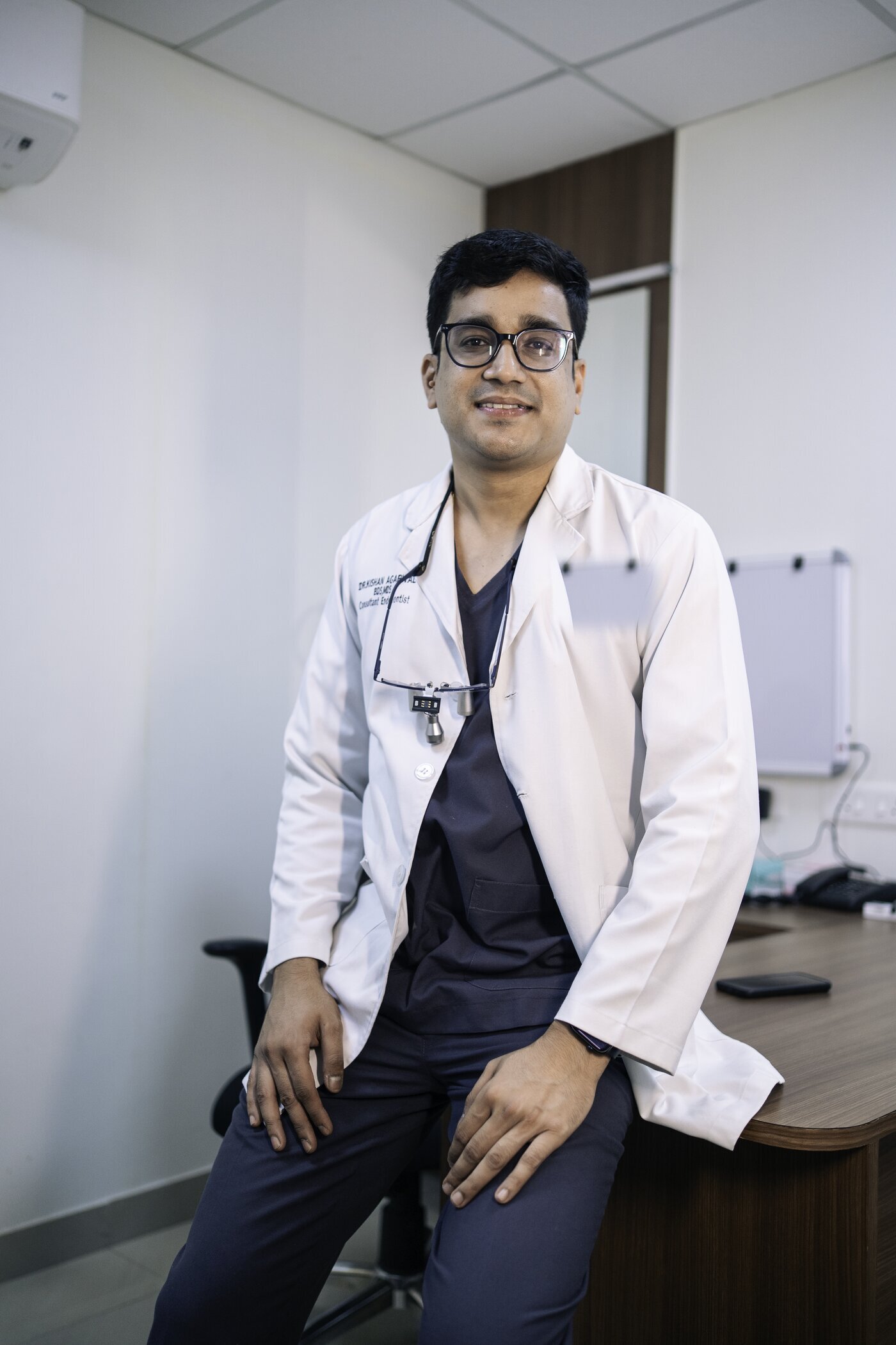 Dr. Kishan Agarwal in his clinic office