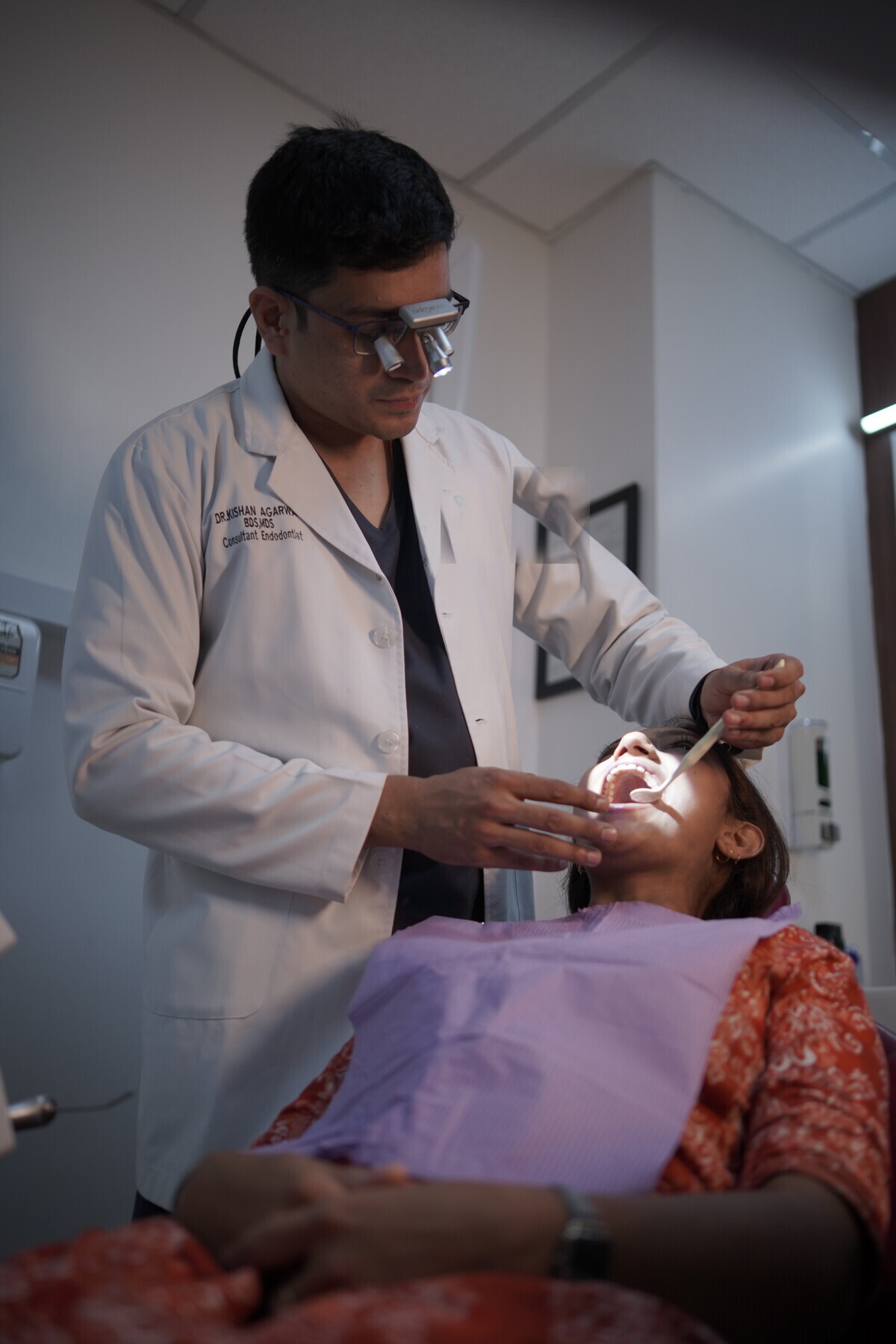 Dr. Kishan Agarwal performing a precise dental procedure
